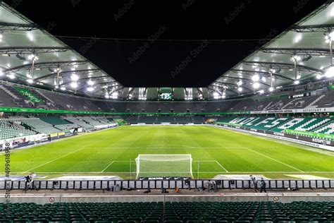 Panoramic night view inside illuminated empty Volkswagen Arena stadium ...