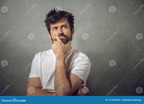 Man Thinking with Funny Face Stock Image - Image of mistrust ...