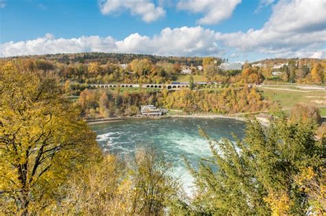 Premium Photo | Rheinfall in autumn, the biggest waterfall in europe