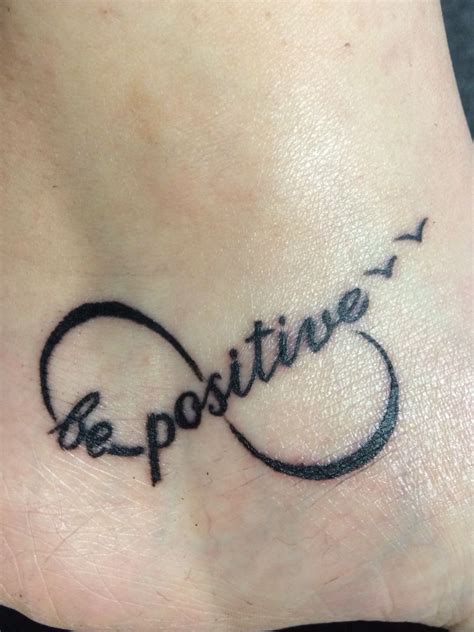 Be positive, tattoo, foot, infinity. Designed by Aneesa Iqbal