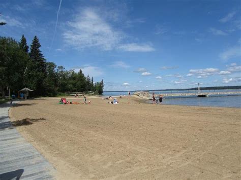 Main Clear Lake beach in Wasagaming before the afternoon crowds arrive - Picture of Riding ...