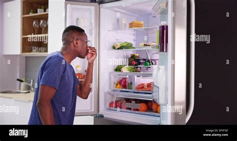 Rotten Food Bad Smell Or Stink In Refrigerator Stock Photo - Alamy