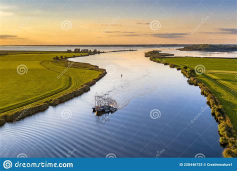 Aerial View of River with Ship at Sunset Stock Image - Image of morning, kraggenburg: 228446725