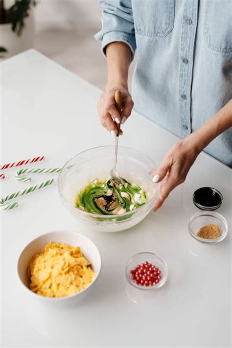 Person Mixing Baking Ingredients in a Bowl · Free Stock Photo