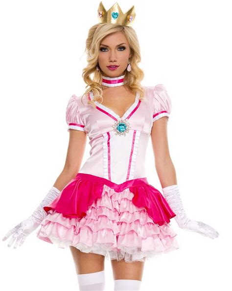 a woman in a pink and white costume is standing with her hands on her hips