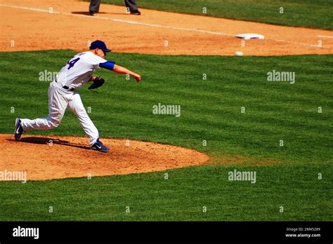 A Chicago Cubs pitcher fires a fastball at Wrigley Field during a baseball game Stock Photo - Alamy