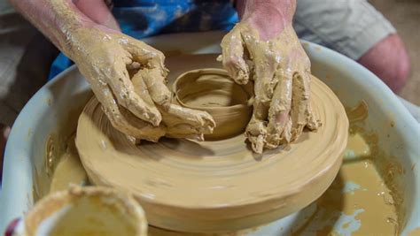 Couple Shaping The Clay On The Working Wheel.Slow Motion Close Up RAW ...