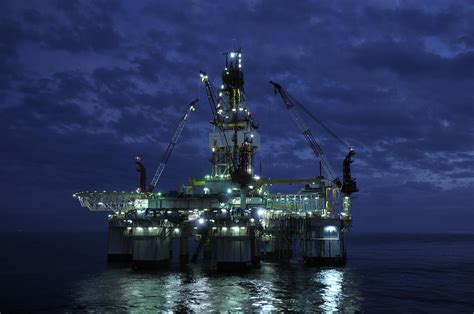 Offshore Oil Rig At Night Photograph by Bradford Martin | Pixels