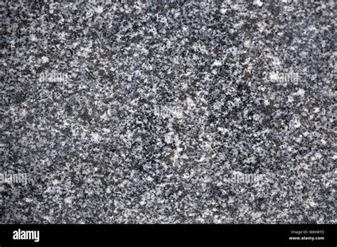 Natural stone grey granite background. Facing material granite texture. Grey granitic background ...