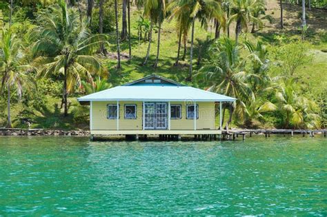 Tropical House Over The Water Viewed From The Sea Stock Photo - Image ...