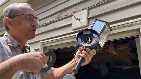 How to install an exterior light fixture on vinyl siding - YouTube