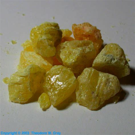 Crystals, a sample of the element Sulfur in the Periodic Table