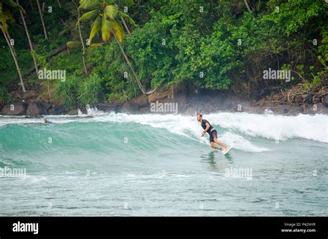 Surfing in Mirissa, Sri Lanka Stock Photo - Alamy