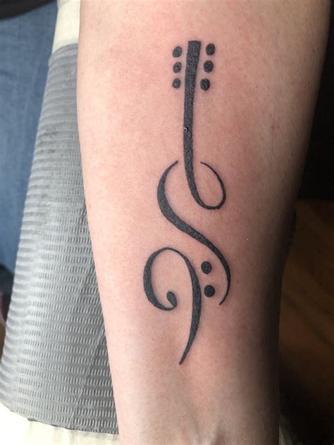 Guitar and music tattoo | Music tattoo designs, Small music tattoos, Music notes tattoo