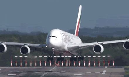 A380 wobbles all over runway as it lands in 20mph winds | Metro News