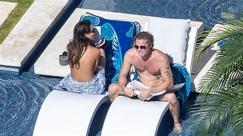 Brad Pitt sunbathes with topless girlfriend Ines de Ramon in Mexico ...