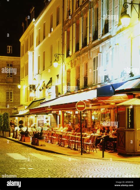 Cafe at St Germain des Pres night PARIS FRANCE Stock Photo - Alamy