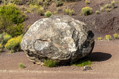 Volcanic Bomb Rock Isolated Outdoors Stock Photo - Download Image Now - Barren, Cloud - Sky ...