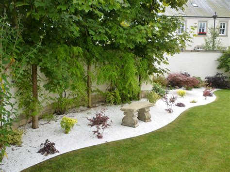 Polar White Gravel- Used beautifully to create a stunning garden border ...