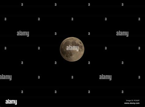 total lunar eclipse, penumbral phase Stock Photo - Alamy