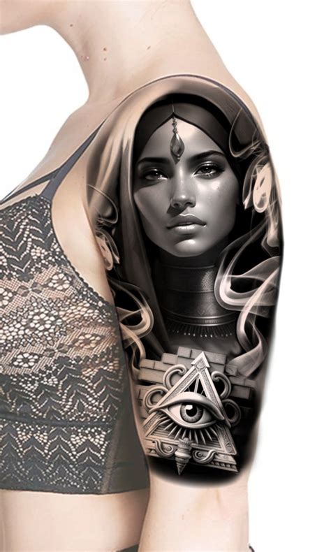 a woman with tattoos on her arm and shoulder