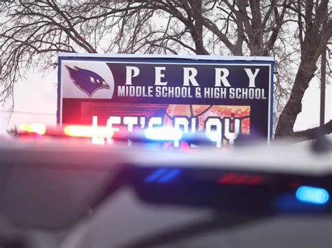 Perry High School principal injured during school shooting dies from ...