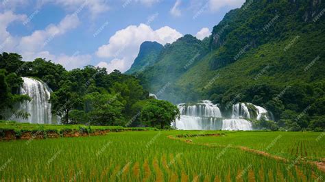 Premium Photo | Aerial view of the waterfall flowing