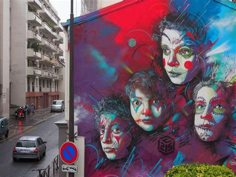 C215 creates a vibrant new mural on the streets of Paris, France ...