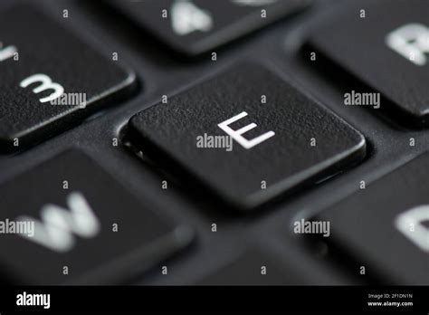 Letter E key on a laptop keyboard Stock Photo - Alamy