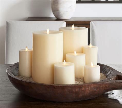 Pottery Barn ~LUMINARA...always better in a grouping ! | Pillar candles ...