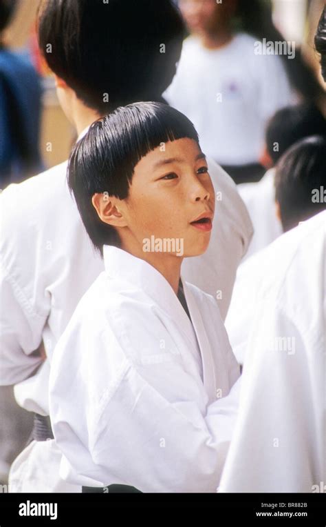 Young Asian boy athlete karate student dojo black belt sport self ...