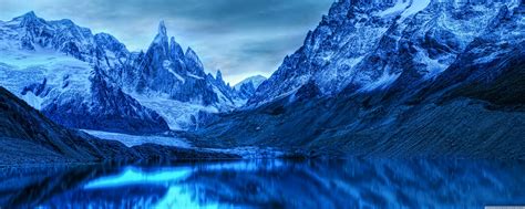Snowy Mountains and Blue Hues