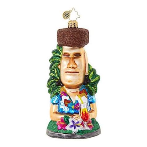 a ceramic ornament with a man wearing a hat and flowers on it's head