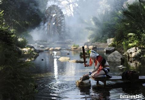 A woman washes clothes in a river in Yunnan, southwest China Yunnan, Craft Shop, Washing Clothes ...