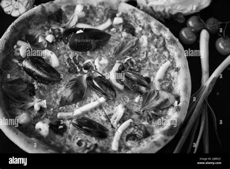 delicious italian pizza with fresh seafood Stock Photo - Alamy