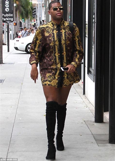 EJ Johnson shows off his toned pins in skimpy shirt dress as he goes shoe shopping in Beverly ...