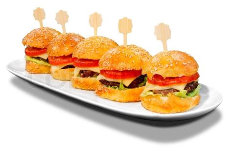 Small hamburgers on a plate, isolated ... | Stock Photo | Colourbox