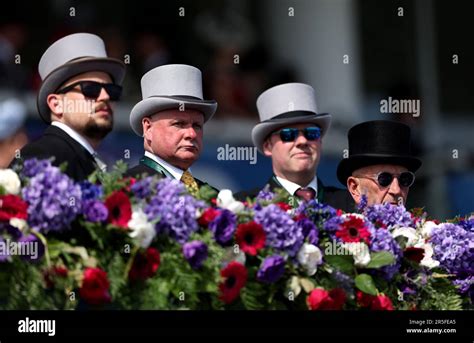 Race goers watch the action during Derby Day of the 2023 Derby Festival ...