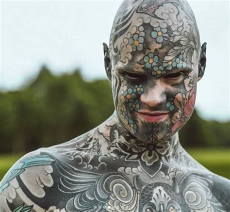 Man with full body tattoos and black eyes revealed to be an elementary teacher causing ...