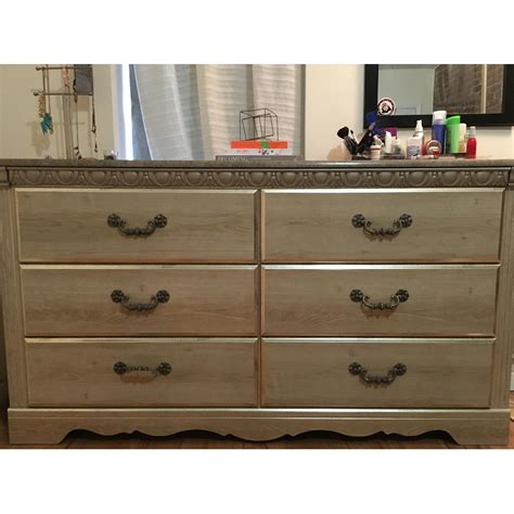 Ashley's 6 Drawer Marble Top Dresser - AptDeco