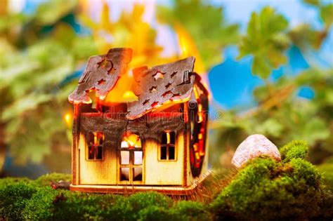 A Toy Wooden House is Burning in Nature. Fire Concept Stock Image - Image of destruction, blast ...