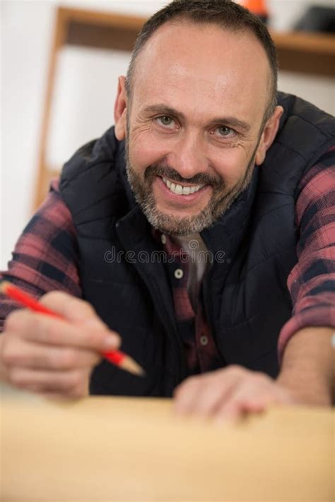 Cheerful Youthful Timber Craftsman Making Drafts Product in Workshop Stock Photo - Image of ...