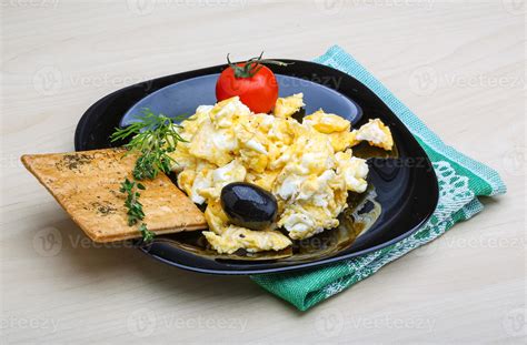 Scrambled eggs with tomato 8527996 Stock Photo at Vecteezy