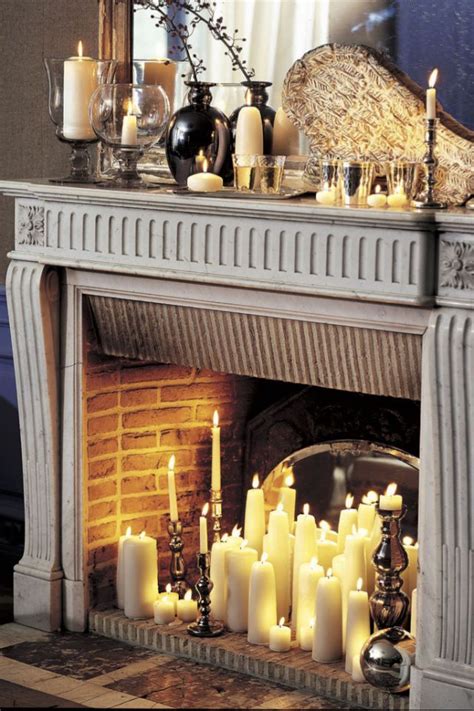 36 Stunning Fireplace Decor Ideas, Just in Time for Winter Weather | Candles in fireplace ...