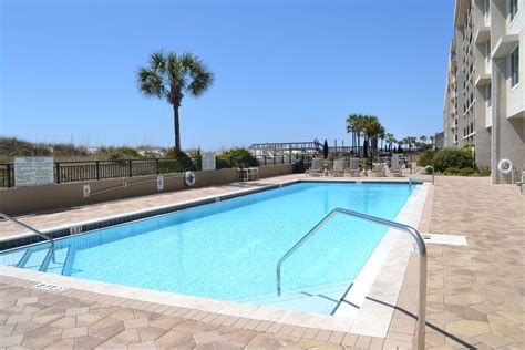 Relax by the pool at The Breakers | Beach condo rentals, Beach condo, Fort walton beach