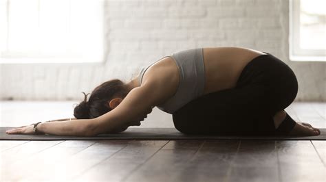 4 simple yoga poses to reduce stress | The GoodLife Fitness Blog