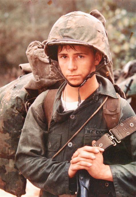 Da Nang, Vietnam. A young Marine private waits on the beach during the ...