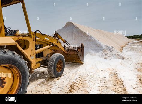 Salt processing, Italy Stock Photo - Alamy