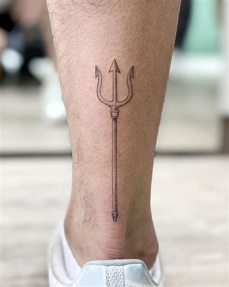 Small trident by @soychapa - Tattoogrid.net