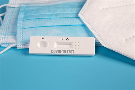 Rapid test kit with different positive and negative for COVID-19 - quick fast blood test ...